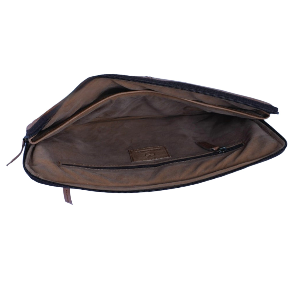 Interior of premium full-grain leather laptop sleeve with spacious compartment