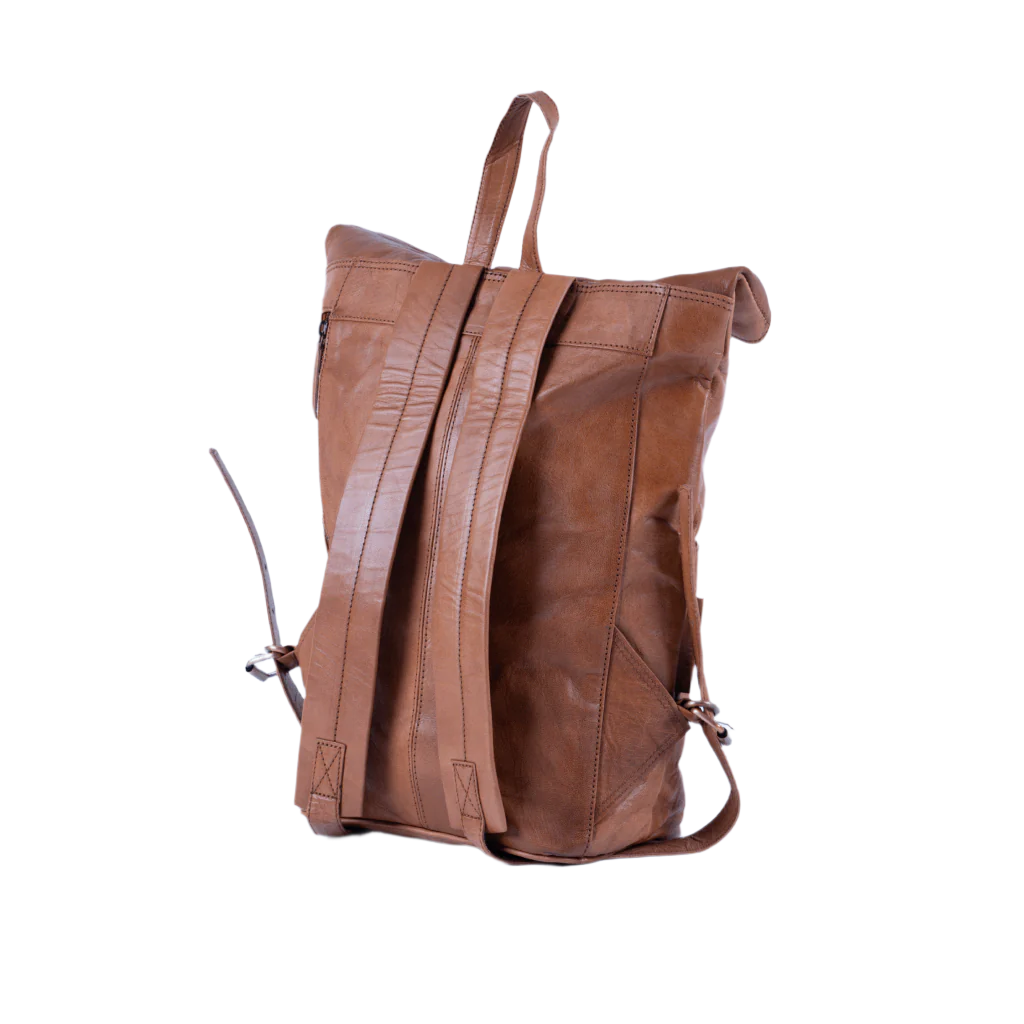 Side view of Havynhide Dhoni full grain leather backpack