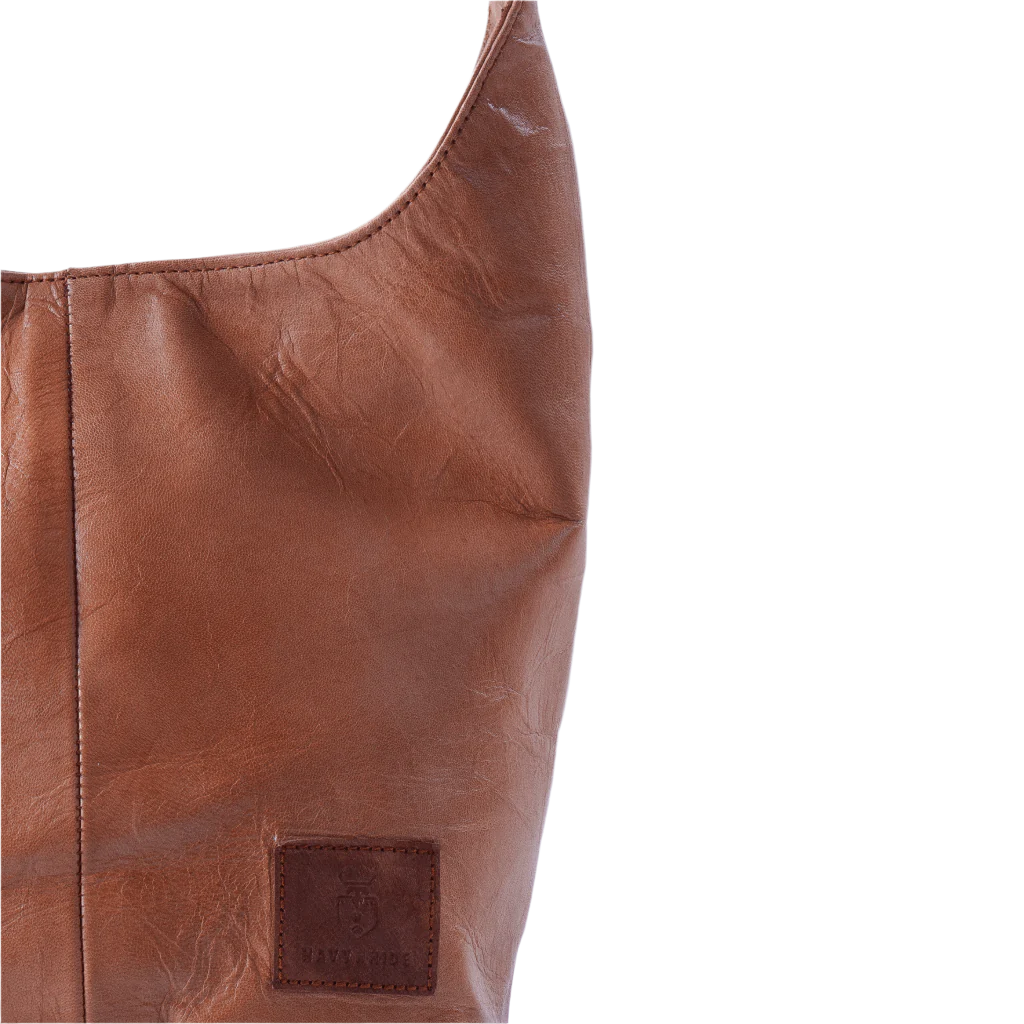 Side view of Havynhide Madhubala full grain leather tote bag