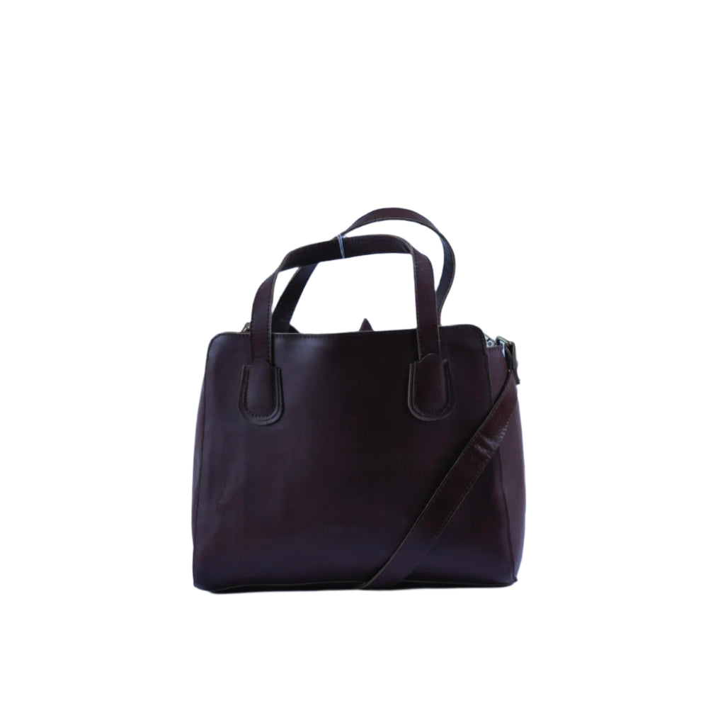 Side view of brown full-grain leather tote bag